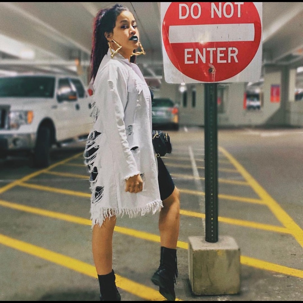 Shredded back white denim jacket